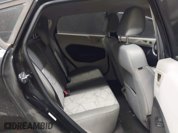 2013 Ford Fiesta SE with VIN 3FADP4EJ1DM107945, listed as a IAAI auction lot 42025064 with Not Provided miles and . Bid and sale history available at DreamBid. Image 8.