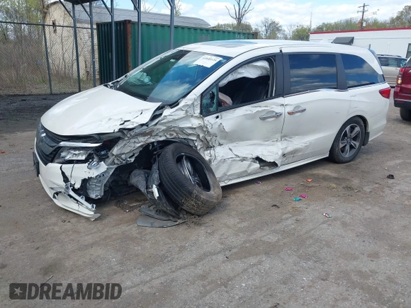 2018 Honda Odyssey Touring with VIN 5FNRL6H81JB023530, listed as a IAAI auction lot 42040124 with 109,128 mi miles and . Bid and sale history available at DreamBid. Image 2.