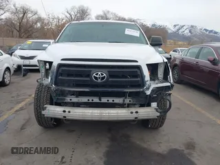 2012 Toyota Tundra z VIN 5TFUM5F11CX039386, wystawiony jako IAAI lot #41472576 z przebiegiem 213 295 mil mil oraz . Historia ofert i sprzedaży dostępna na DreamBid. Obrazek 13.