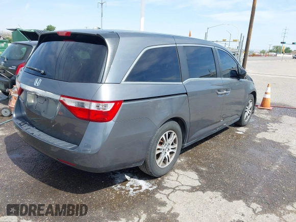 2011 Honda Odyssey EX-L with VIN 5FNRL5H68BB086943, listed as a IAAI auction lot 42503744 with 225,376 mi miles and . Bid and sale history available at DreamBid. Image 4.