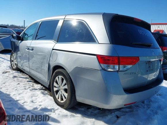 2017 Honda Odyssey EX-L with VIN 5FNRL5H6XHB003389, listed as a IAAI auction lot 41329731 with 203,368 mi miles and . Bid and sale history available at DreamBid. Image 3.