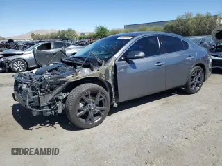 2014 Nissan Maxima S with VIN 1N4AA5AP2EC492648, listed as a Copart auction lot 60300065 with 95,131 mi miles and Salvage title. Bid and sale history available at DreamBid. Image 1.