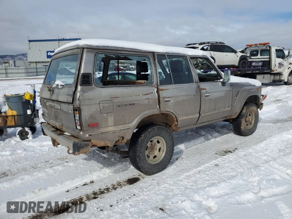 1985 Toyota Land Cruiser z VIN JT3FJ60G8F1127643, wystawiony jako Copart lot #46289955 z przebiegiem 276 869 mil mil oraz Czysty tytuł • Clean title. Historia ofert i sprzedaży dostępna na DreamBid. Obrazek 3.