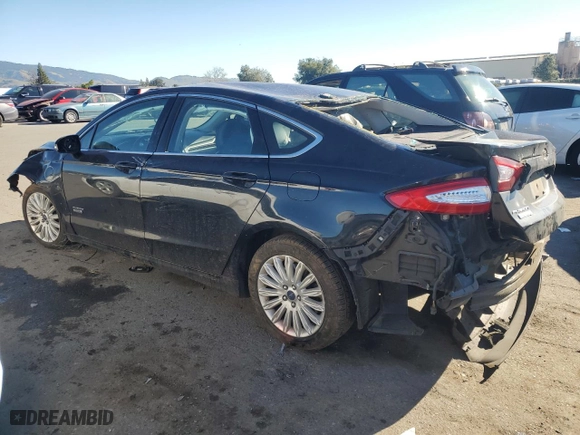2015 Ford Fusion Energi SE Luxury with VIN 3FA6P0PU8FR284555, listed as a Copart auction lot 88094755 with 215,493 mi miles and Salvage Title. Bid and sale history available at carsss.com. Image 2.