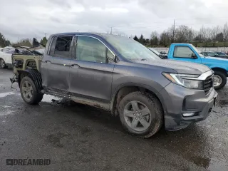 2021 Honda Ridgeline RTL-E with VIN 5FPYK3F74MB015036, listed as a Copart auction lot 43269105 with 64,631 mi miles and Salvage Title. Bid and sale history available at carsss.com. Image 4.