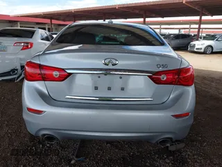 2015 Infiniti Q50 Premium with VIN JN1BV7AP9FM333610, listed as a IAAI auction lot 42029779 with 168,740 mi miles. Bid and sale history available at carsss.com. Image 16.