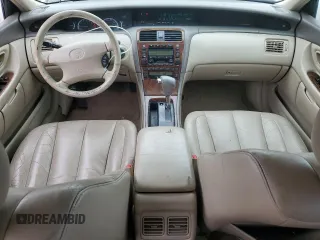 2001 Toyota Avalon XL z VIN 4T1BF28B31U136069, wystawiony jako Copart lot #57355025 z przebiegiem 217 489 mil mil oraz Szkody całkowita. Historia ofert i sprzedaży dostępna na DreamBid. Obrazek 8.