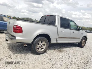 2002 Ford F-150 XLT with VIN 1FTRW07L12KA11845, listed as a Copart auction lot 51987205 with 282,865 mi miles and Salvage Title. Bid and sale history available at carsss.com. Image 3.
