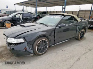 2001 Ford Mustang GT Deluxe with VIN 1FAFP45X51F138687, listed as a Copart auction lot 59210885 with Not provided miles and Salvage title. Bid and sale history available at DreamBid. Image 1.