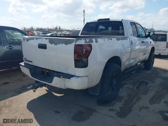 2011 Toyota Tundra 2WD Truck with VIN 5TFRY5F14BX115286, listed as a IAAI auction lot 41540295 with 261,464 mi miles. Bid and sale history available at carsss.com. Image 4.