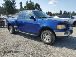1998 Ford F-150 with VIN 2FTZX08W2WCA63145, listed as a Copart auction lot 58833155 with 251,370 mi miles and Clean title. Bid and sale history available at DreamBid. Image 4.