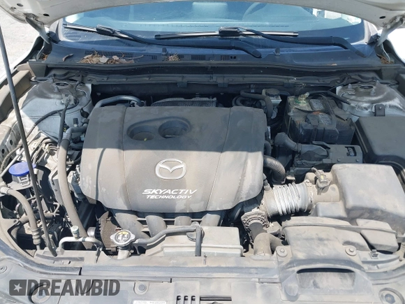 2015 Mazda 3 i Sport z VIN 3MZBM1U72FM168302, wystawiony jako IAAI lot #42331347 z przebiegiem 122 801 mil mil oraz . Historia ofert i sprzedaży dostępna na DreamBid. Obrazek 10.