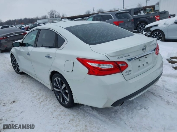 2016 Nissan Altima 2.5 SR with VIN 1N4AL3AP1GN383538, listed as a IAAI auction lot 41264765 with 129,836 mi miles. Bid and sale history available at carsss.com. Image 3.