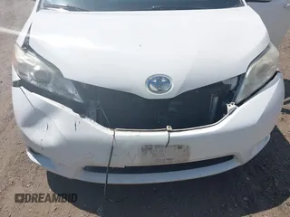 2015 Toyota Sienna LE AAS with VIN 5TDKK3DC1FS599053, listed as a IAAI auction lot 42216805 with 167,280 mi miles and . Bid and sale history available at DreamBid. Image 6.