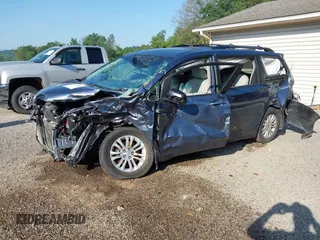 2014 Toyota Sienna XLE with VIN 5TDYK3DCXES524294, listed as a IAAI auction lot 42546467 with 122,257 mi miles and . Bid and sale history available at DreamBid. Image 22.