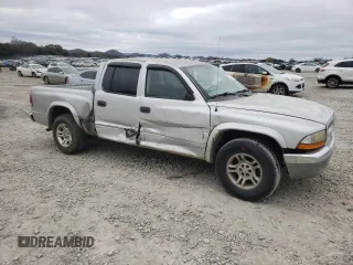 2003 Dodge Dakota SLT with VIN 1D7HL48X13S151334, listed as a Copart auction lot 82016764 with 216,281 mi miles and Salvage Title. Bid and sale history available at carsss.com. Image 4.