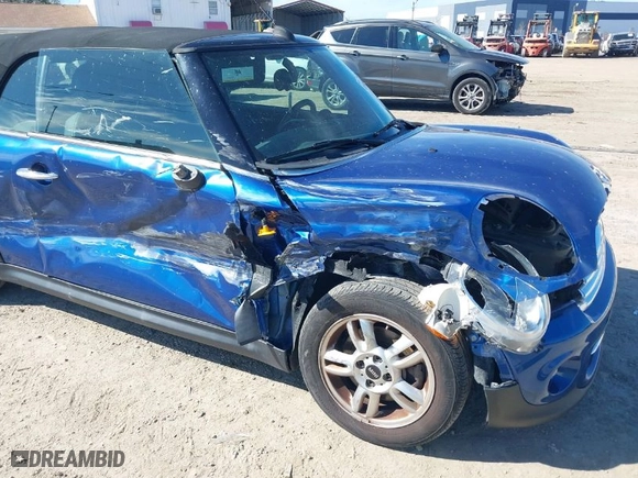 2013 MINI Cooper Convertible with VIN WMWZN3C56DT135566, listed as a IAAI auction lot 41414064 with 58,593 mi miles. Bid and sale history available at carsss.com. Image 6.