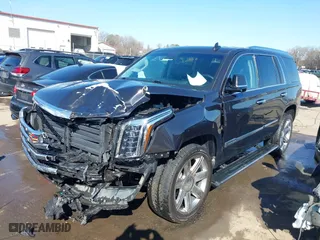 2019 Cadillac Escalade Premium Luxury with VIN 1GYS4CKJ1KR407662, listed as a IAAI auction lot 41519495 with 101,892 mi miles. Bid and sale history available at carsss.com. Image 2.