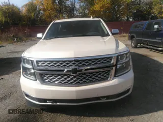 2015 Chevrolet Suburban LTZ with VIN 1GNSKKKC0FR551031, listed as a IAAI auction lot 40694559 with 184,261 mi miles. Bid and sale history available at carsss.com. Image 12.