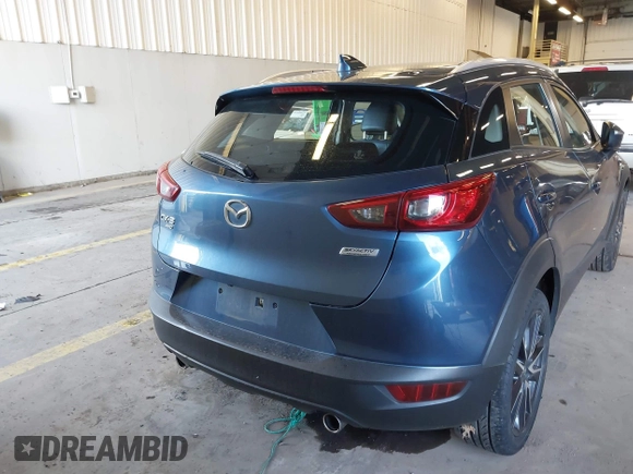 2018 Mazda CX-3 Touring z VIN JM1DKFC78J1323439, wystawiony jako IAAI lot #41725784 z przebiegiem 134 055 mil mil oraz . Historia ofert i sprzedaży dostępna na DreamBid. Obrazek 16.