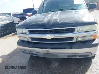 2004 Chevrolet Tahoe LT with VIN 1GNEC13Z74J323109, listed as a IAAI auction lot 41829422 with 261,636 mi miles. Bid and sale history available at carsss.com. Image 6.