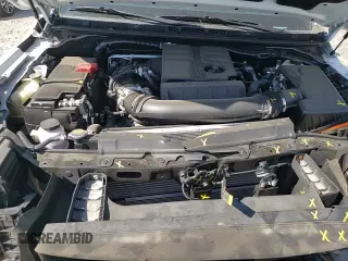 2025 Nissan Frontier SV z VIN 1N6ED1FK0SN619225, wystawiony jako Copart lot #70269215 z przebiegiem 7 049 mil mil oraz Szkoda całkowita • Salvage title. Historia ofert i sprzedaży dostępna na DreamBid. Obrazek 14.