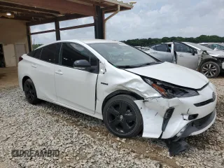 2021 Toyota Prius L Eco with VIN JTDKAMFU4M3129824, listed as a Copart auction lot 57788635 with 38,556 mi miles and Salvage title. Bid and sale history available at DreamBid. Image 4.