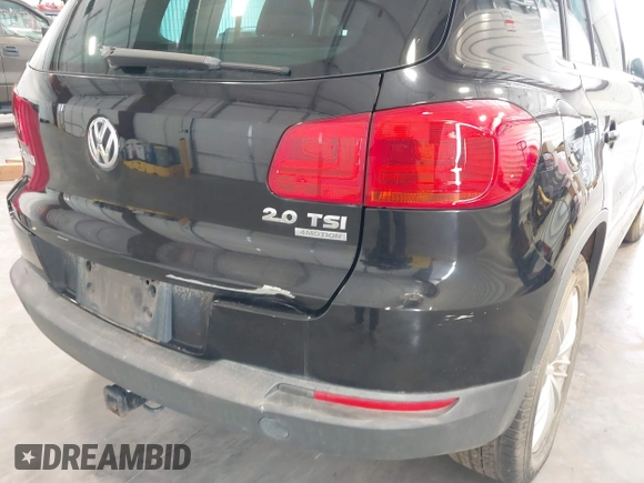 2012 Volkswagen Tiguan SE with VIN WVGBV7AX2CW503301, listed as a IAAI auction lot 42679407 with 90,603 mi miles and . Bid and sale history available at DreamBid. Image 6.