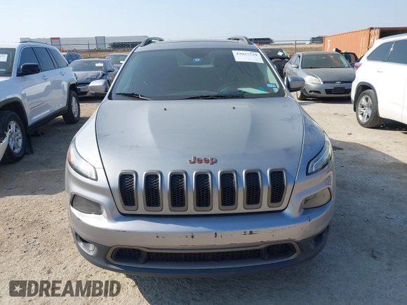 2016 Jeep Cherokee Latitude with VIN 1C4PJLCB7GW256587, listed as a IAAI auction lot 42037539 with 209,267 mi miles. Bid and sale history available at carsss.com. Image 12.