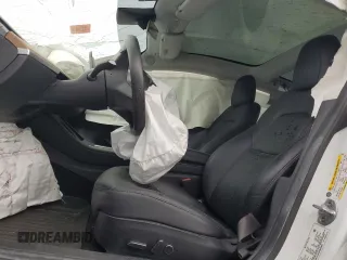 2021 Tesla Model 3 Standard Range Plus z VIN 5YJ3E1EA2MF859832, wystawiony jako Copart lot #56743865 z przebiegiem 77 025 mil mil oraz Nie do naprawy. Historia ofert i sprzedaży dostępna na DreamBid. Obrazek 7.