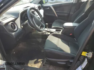 2018 Toyota RAV4 XLE with VIN 2T3RFREV0JW765995, listed as a Copart auction lot 63968785 with 114,598 mi miles and Salvage title. Bid and sale history available at DreamBid. Image 7.