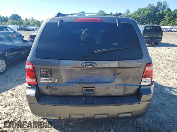 2011 Ford Escape XLT z VIN 1FMCU9D78BKC35522, wystawiony jako Copart lot #65952115 z przebiegiem 130 875 mil mil oraz Czysty tytuł • Clean title. Historia ofert i sprzedaży dostępna na DreamBid. Obrazek 6.