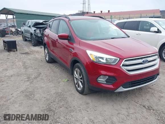 2018 Ford Escape SE z VIN 1FMCU9GD6JUA18684, wystawiony jako IAAI lot #41499540 z przebiegiem 105 127 mil mil oraz . Historia ofert i sprzedaży dostępna na DreamBid. Obrazek 1.