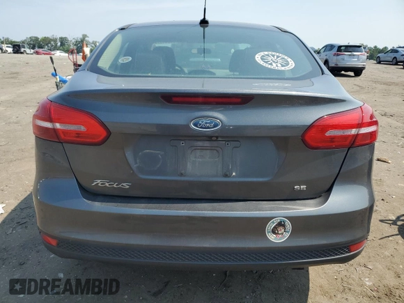 2017 Ford Focus SE with VIN 1FADP3F25HL202470, listed as a Copart auction lot 59941835 with 142,628 mi miles and Salvage title. Bid and sale history available at DreamBid. Image 6.