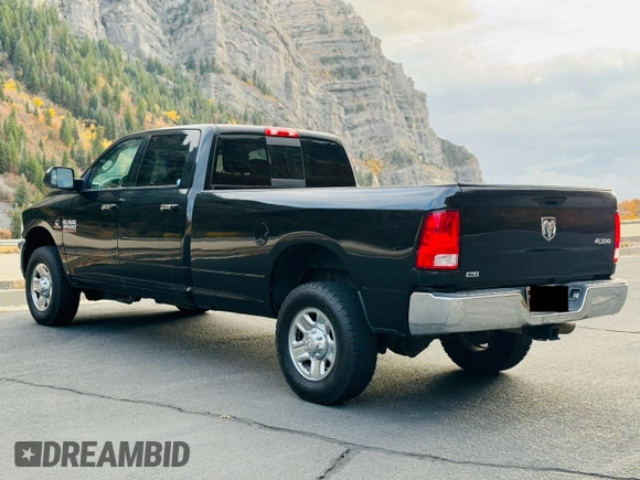 2015 Ram 3500 Big Horn with VIN 3C63R3HL4FG625161, listed as a Copart auction lot 80120264 with 111,896 mi miles and Salvage Title. Bid and sale history available at carsss.com. Image 3.