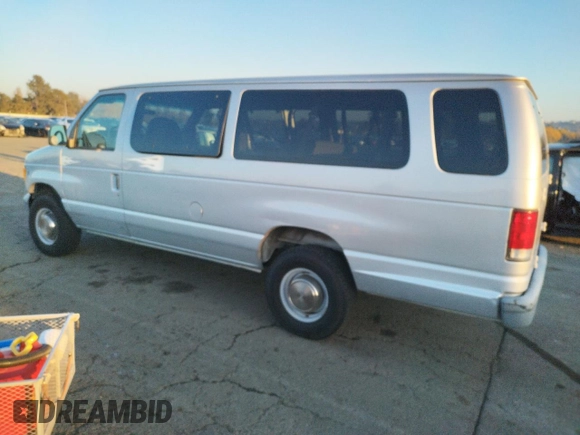 1999 Ford Econoline Passenger XL with VIN 1FBSS31L6XHC07800, listed as a Copart auction lot 83122494 with 96,238 mi miles and Clean Title. Bid and sale history available at DreamBid. Image 2.