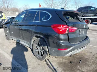 2017 BMW X1 xDrive28i with VIN WBXHT3C37H5F82992, listed as a IAAI auction lot 41293740 with 161,418 mi miles. Bid and sale history available at carsss.com. Image 3.