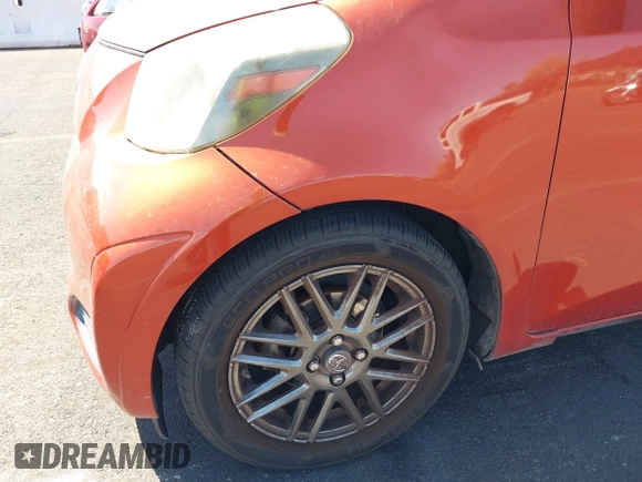 2012 Scion iQ с VIN JTNJJXB05CJ013263, выставлен на аукционе IAAI как лот 42087710 с пробегом 124 463 миль миль и . История ставок и продаж доступна на DreamBid. Изображение 14.