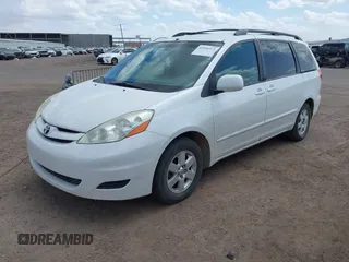 2009 Toyota Sienna XLE with VIN 5TDZK22C59S266936, listed as a IAAI auction lot 41954371 with 272,039 mi miles and . Bid and sale history available at carsss.com. Image 2.