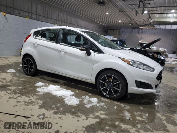 2016 Ford Fiesta SE with VIN 3FADP4EJ1GM148080, listed as a Copart auction lot 82866204 with 126,402 mi miles and Salvage Title. Bid and sale history available at DreamBid. Image 4.