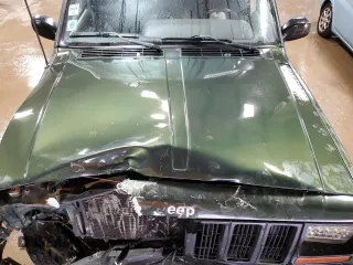 1998 Jeep Cherokee Sport with VIN 1J4FJ68S3WL146331, listed as a Copart auction lot 49420995 with 200,040 mi miles and Salvage Title. Bid and sale history available at carsss.com. Image 11.