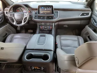 2021 Chevrolet Suburban Z71 with VIN 1GNSKDKDXMR310076, listed as a Copart auction lot 43055185 with 88,300 mi miles and Salvage title. Bid and sale history available at DreamBid. Image 8.