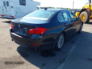 2013 BMW 5 Series 535i xDrive with VIN WBAFU7C5XDDU73107, listed as a IAAI auction lot 42556498 with 177,229 mi miles and . Bid and sale history available at DreamBid. Image 4.