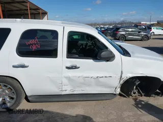2013 Chevrolet Tahoe Commercial with VIN 1GNLC2E06DR348757, listed as a IAAI auction lot 41711877 with 163,473 mi miles and . Bid and sale history available at DreamBid. Image 13.