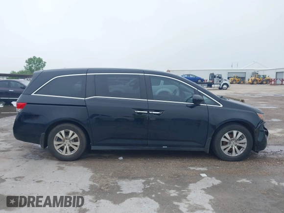 2014 Honda Odyssey EX-L with VIN 5FNRL5H64EB114709, listed as a IAAI auction lot 42131146 with 145,616 mi miles and . Bid and sale history available at DreamBid. Image 13.