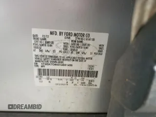2013 Ford Explorer XLT z VIN 1FM5K7D80DGB81456, wystawiony jako Copart lot #56391335 z przebiegiem 133 204 mil mil oraz Szkoda całkowita • Salvage title. Historia ofert i sprzedaży dostępna na DreamBid. Obrazek 13.