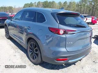 2021 Mazda CX-9 Carbon Edition with VIN JM3TCADY9M0517174, listed as a IAAI auction lot 41871485 with 48,484 mi miles and . Bid and sale history available at DreamBid. Image 3.