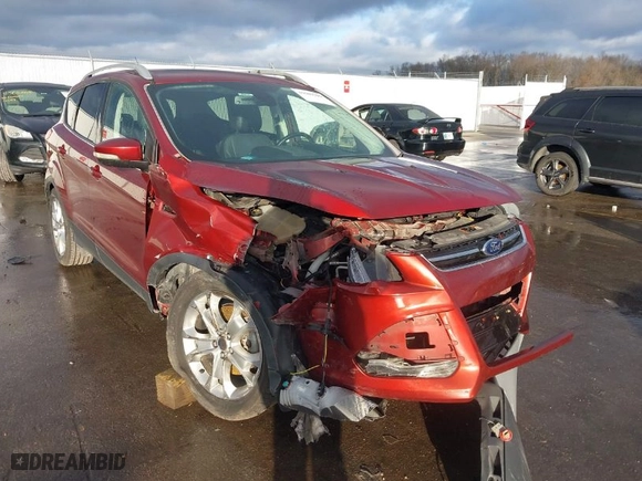 2015 Ford Escape Titanium with VIN 1FMCU0J95FUB27483, listed as a IAAI auction lot 41509309 with 128,810 mi miles. Bid and sale history available at carsss.com. Image 6.