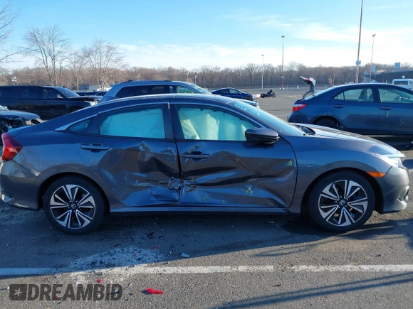 2017 Honda Civic Sedan EX-T with VIN 2HGFC1F39HH652424, listed as a IAAI auction lot 41750943 with 44,174 mi miles. Bid and sale history available at carsss.com. Image 13.