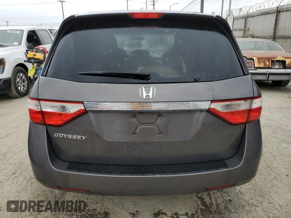 2013 Honda Odyssey EX z VIN 5FNRL5H40DB070687, wystawiony jako Copart lot #58624925 z przebiegiem 232 232 mil mil oraz Czysty tytuł • Clean title. Historia ofert i sprzedaży dostępna na DreamBid. Obrazek 6.